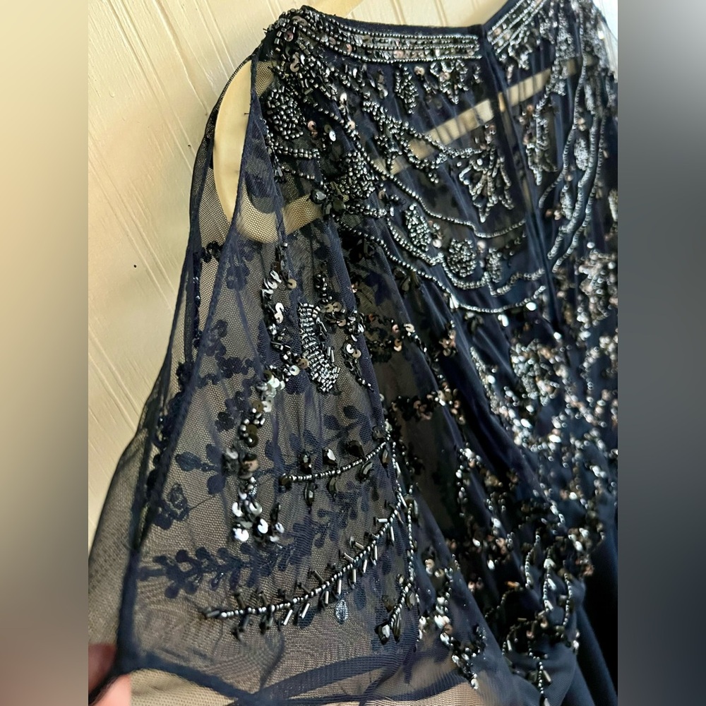 Aidan Mattox flutter sleeve beaded gown. - Picture 3 of 6